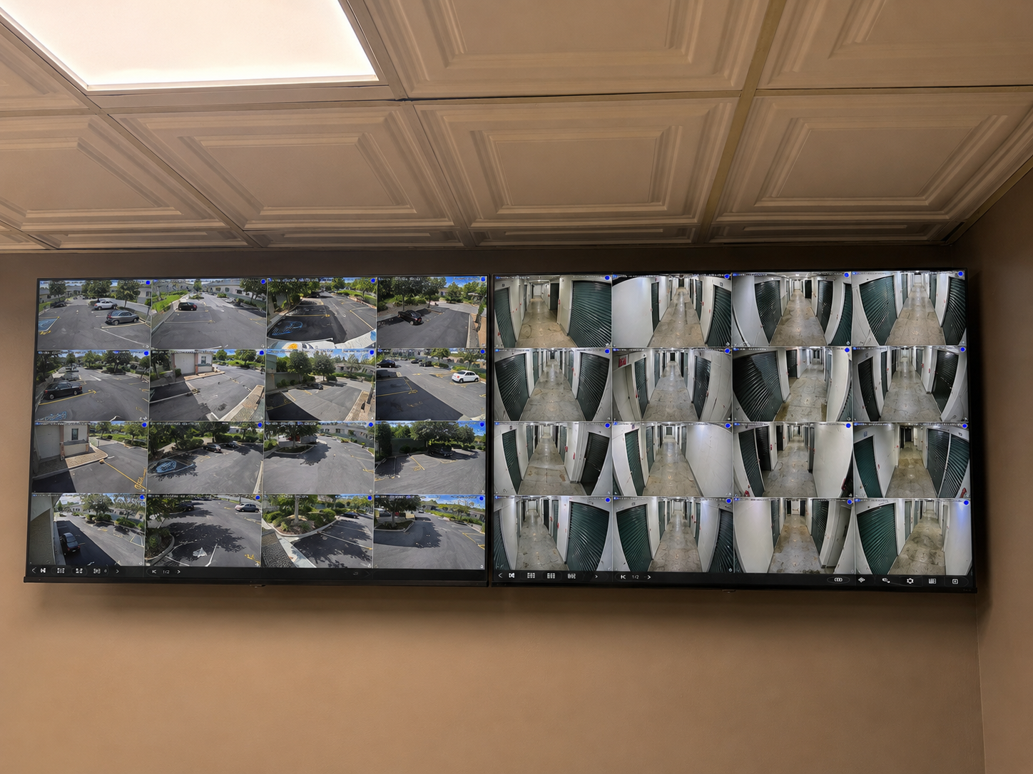 Camera monitoring displays for a storage facility parking lot and interior hallways