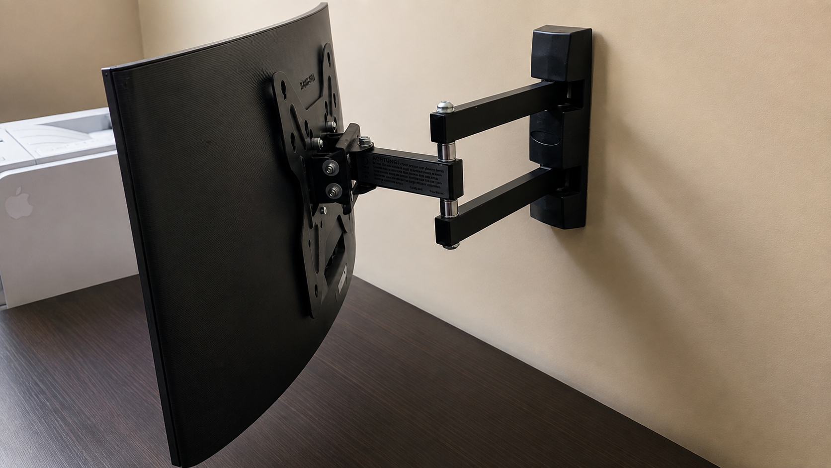 Full-motion articulating TV wall mount installed in an office